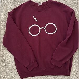 Gildan burgundy Crewneck Sweatshirt with Harry Potter Design. Size large.
